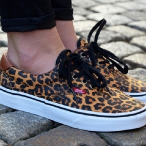 red vans with leopard inside